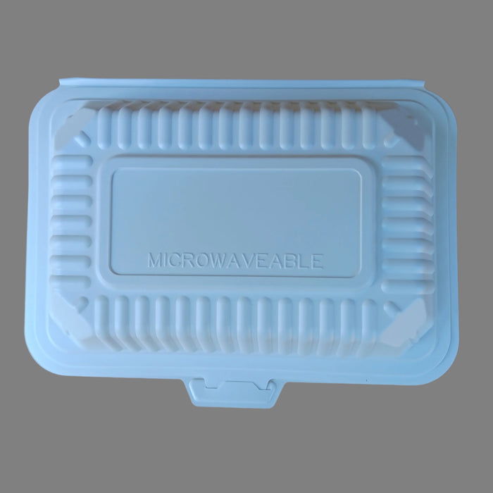 9 x 6 white microwaveable container lid on a cardboard background